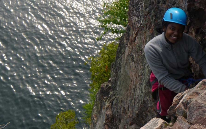 high school students learn rock climbing skills in boundary waters